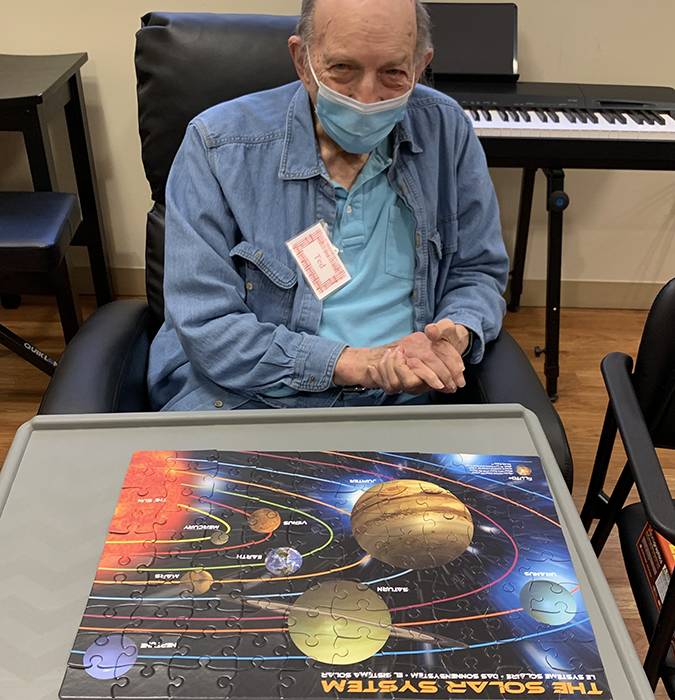 Resident Doing a Puzzle